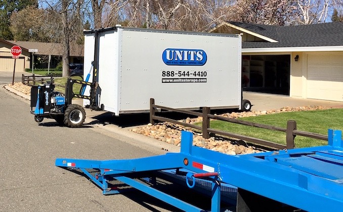 image of portable storage in west sacramento container being delivered by UNITS robo unit
